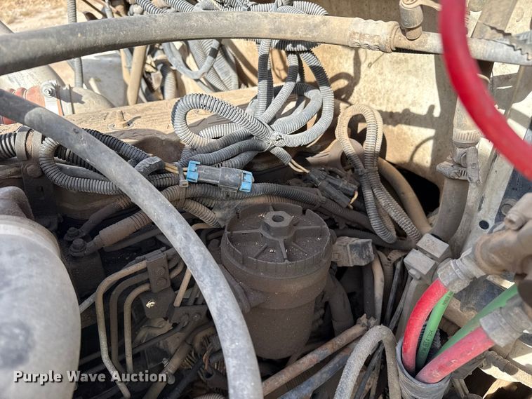 image for item EP0991 1998 Freightliner FL60 rollback truck