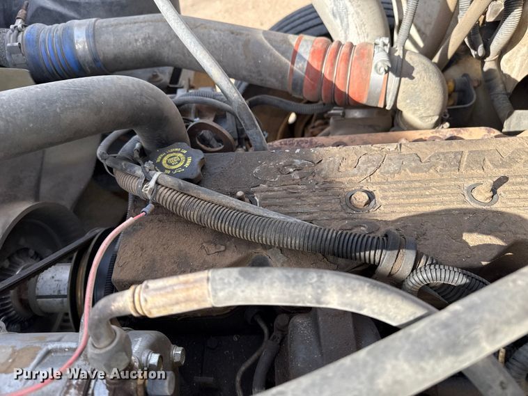 image for item EP0991 1998 Freightliner FL60 rollback truck