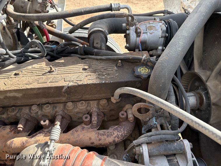 image for item EP0991 1998 Freightliner FL60 rollback truck