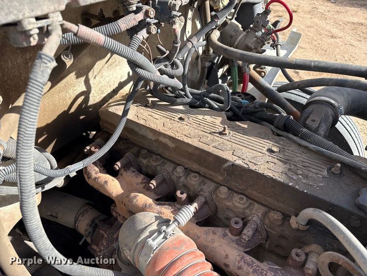 image for item EP0991 1998 Freightliner FL60 rollback truck