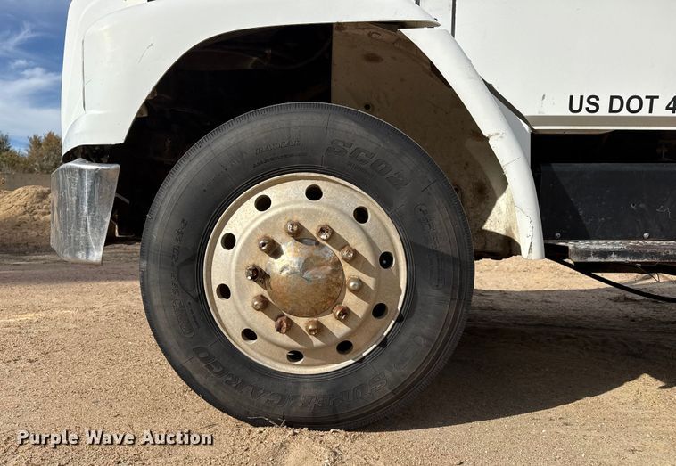 image for item EP0991 1998 Freightliner FL60 rollback truck