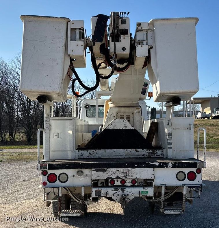 image for item EN5889 1999 Freightliner FL70 bucket truck