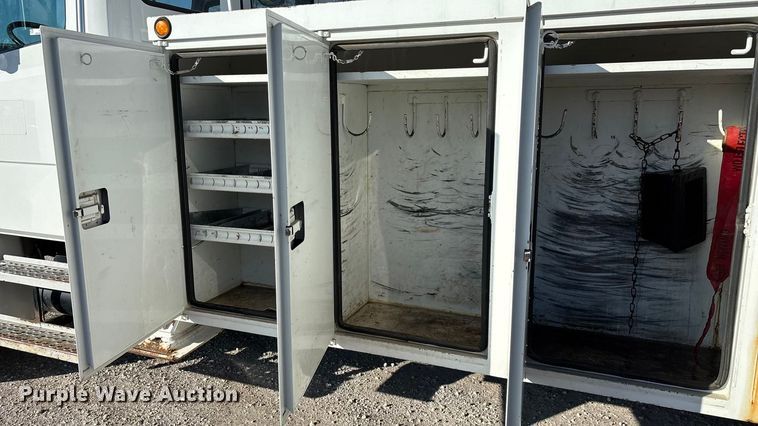 image for item EN5889 1999 Freightliner FL70 bucket truck