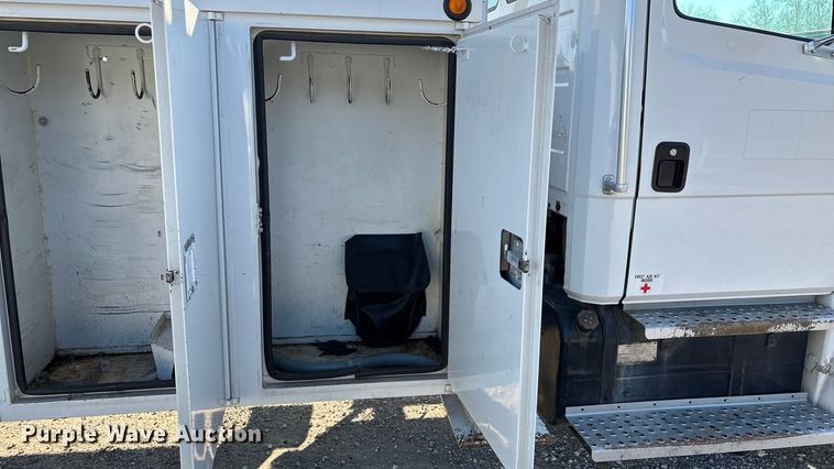 image for item EN5889 1999 Freightliner FL70 bucket truck