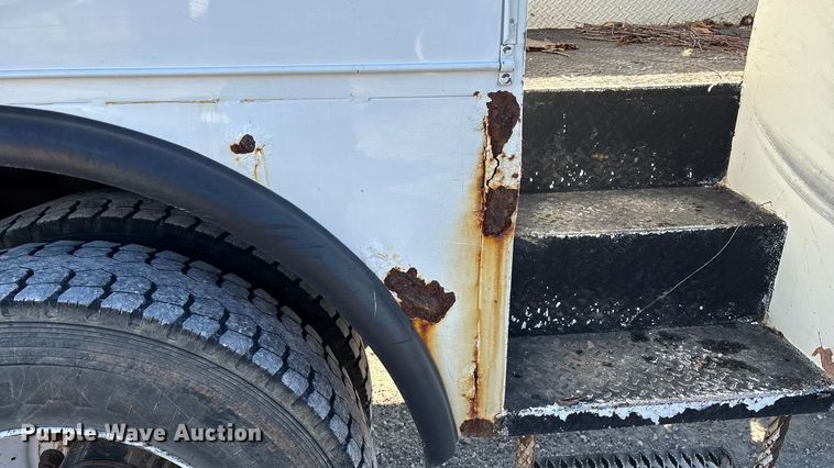 image for item EN5889 1999 Freightliner FL70 bucket truck