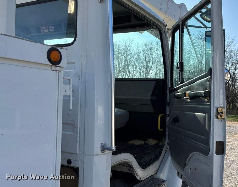 image for item EN5889 1999 Freightliner FL70 bucket truck