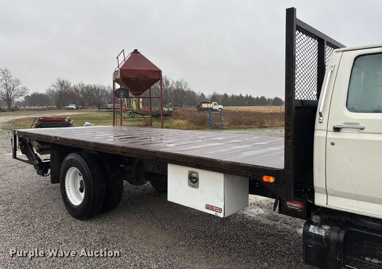 image for item EV3362 1998 Ford F700 flatbed truck