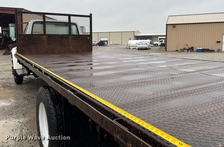 image for item EV3362 1998 Ford F700 flatbed truck