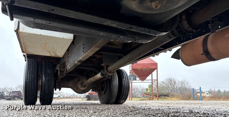 image for item EV3362 1998 Ford F700 flatbed truck