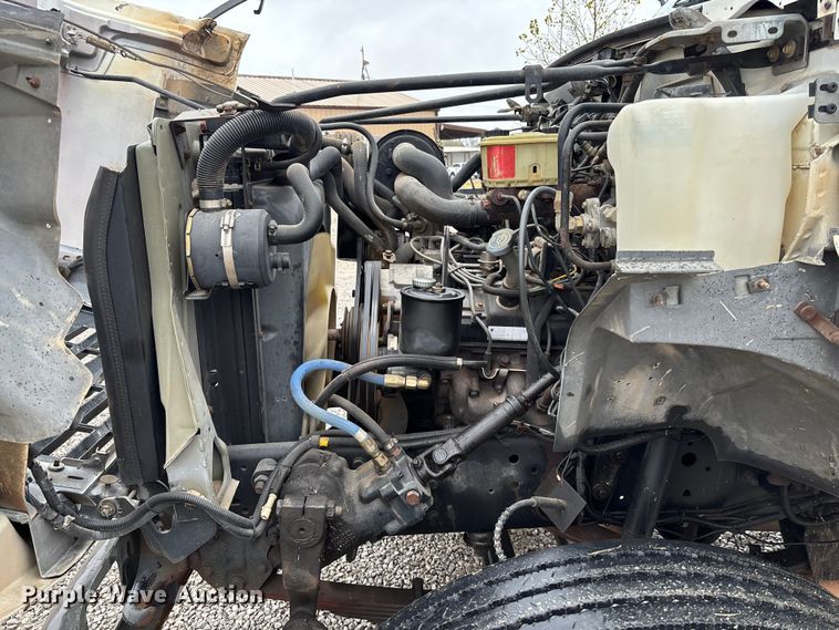 image for item EV3362 1998 Ford F700 flatbed truck