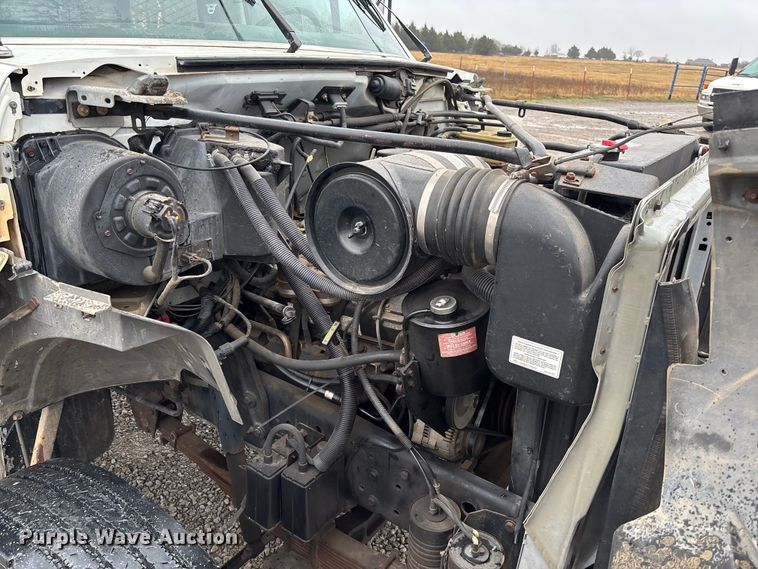 image for item EV3362 1998 Ford F700 flatbed truck