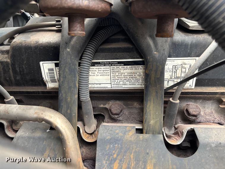 image for item EV3362 1998 Ford F700 flatbed truck