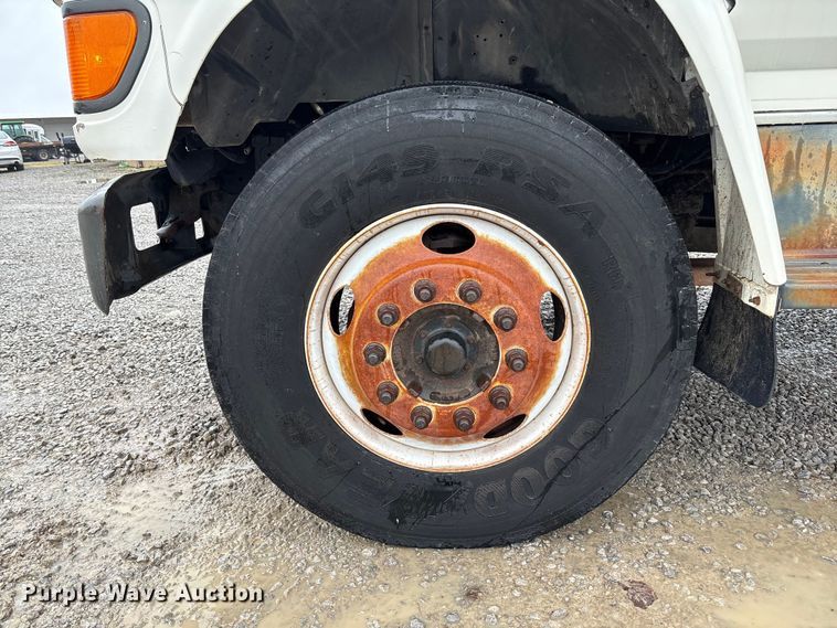 image for item EV3362 1998 Ford F700 flatbed truck