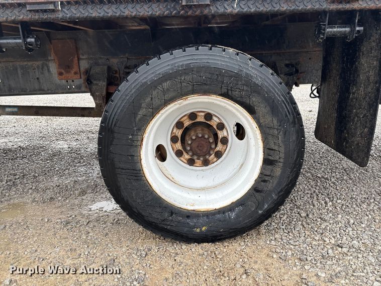 image for item EV3362 1998 Ford F700 flatbed truck