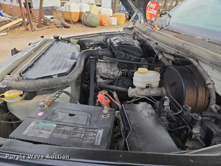 image for item ET5442 2001 Dodge Ram 1500 flatbed pickup truck