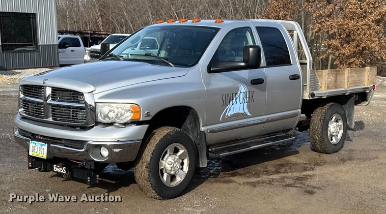 image for item EA2219 2004 Dodge Ram 2500 Ext. Cab flatbed pickup truck
