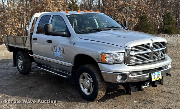 image for item EA2219 2004 Dodge Ram 2500 Ext. Cab flatbed pickup truck