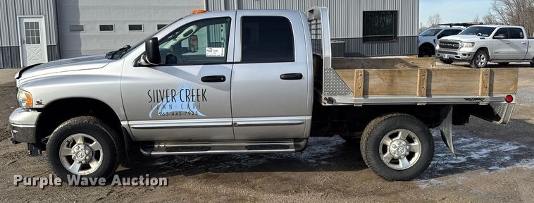 image for item EA2219 2004 Dodge Ram 2500 Ext. Cab flatbed pickup truck