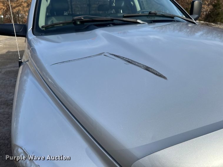 image for item EA2219 2004 Dodge Ram 2500 Ext. Cab flatbed pickup truck