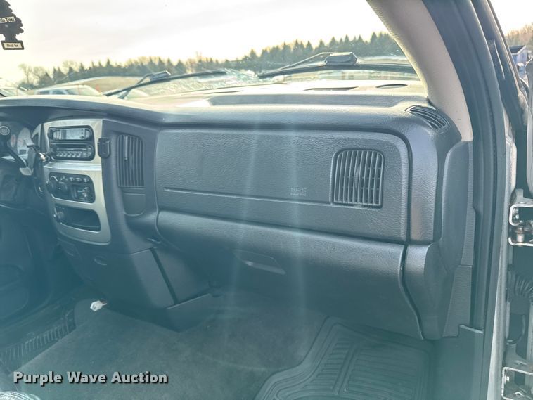 image for item EA2219 2004 Dodge Ram 2500 Ext. Cab flatbed pickup truck