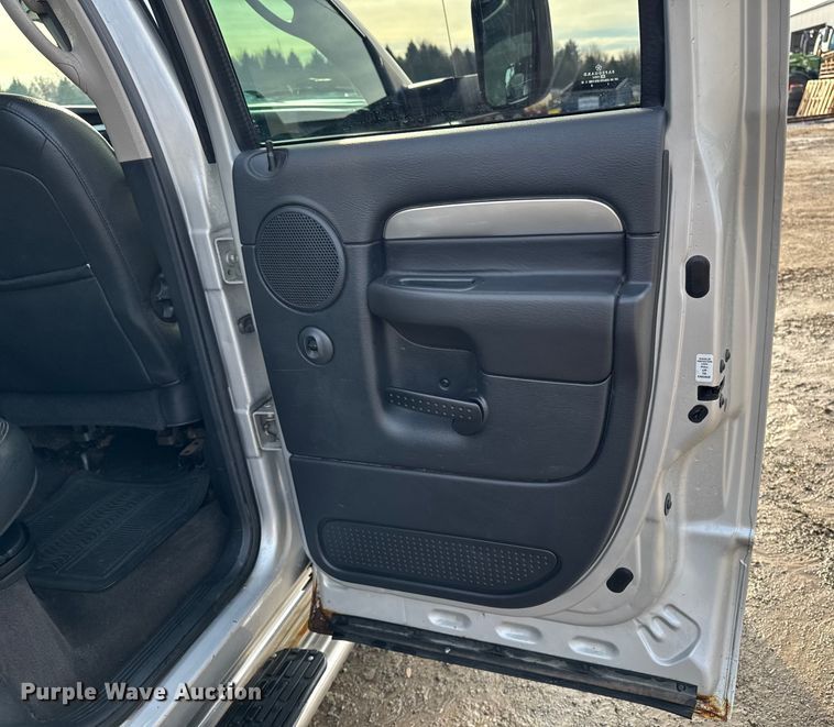 image for item EA2219 2004 Dodge Ram 2500 Ext. Cab flatbed pickup truck