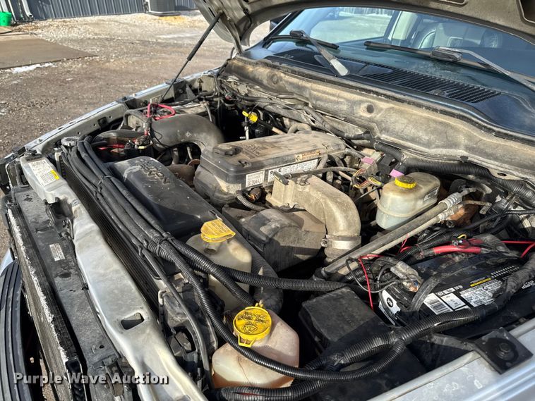 image for item EA2219 2004 Dodge Ram 2500 Ext. Cab flatbed pickup truck