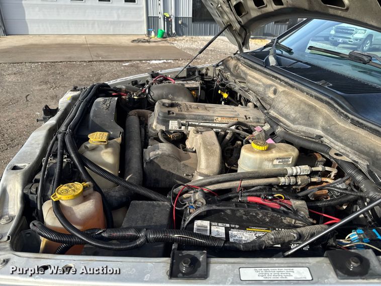 image for item EA2219 2004 Dodge Ram 2500 Ext. Cab flatbed pickup truck