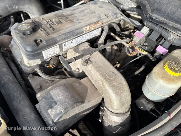 image for item EA2219 2004 Dodge Ram 2500 Ext. Cab flatbed pickup truck