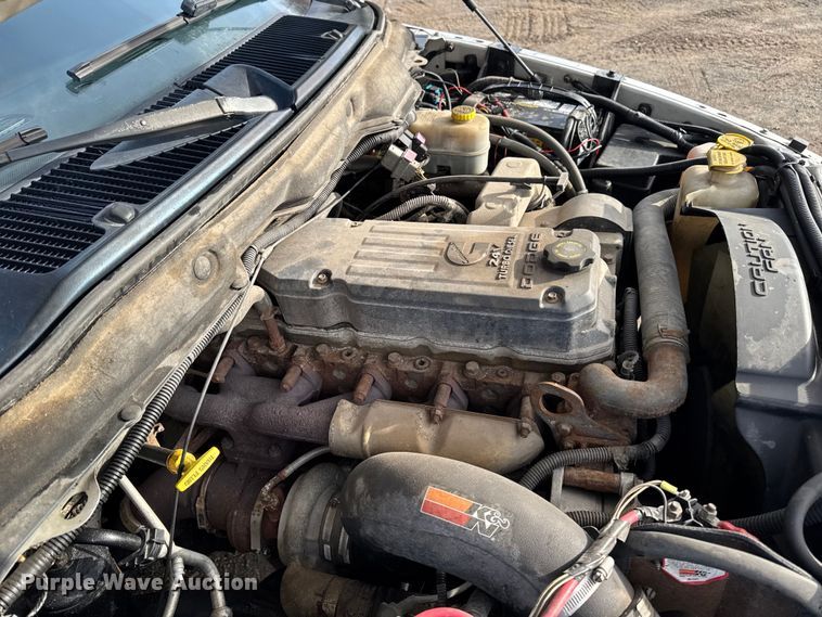 image for item EA2219 2004 Dodge Ram 2500 Ext. Cab flatbed pickup truck