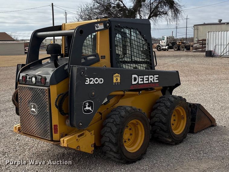 MINI CARGADOR SOBRE RUEDAS 2012 JOHN DEERE 320D
