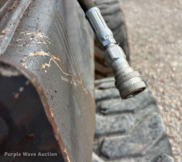 image for item EA7874 2012 John Deere 320D skid steer loader