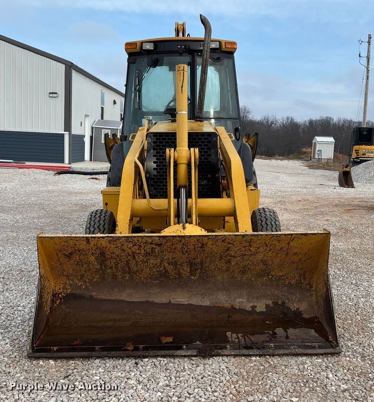 image for item ED2444 1999 John Deere 310E backhoe