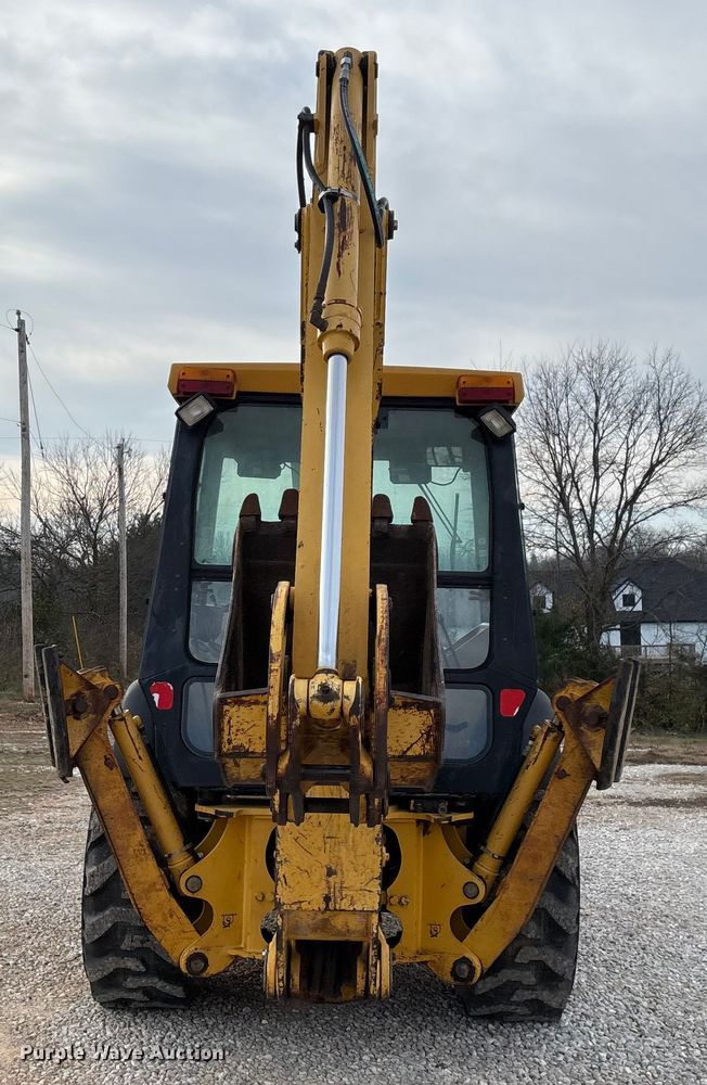 image for item ED2444 1999 John Deere 310E backhoe