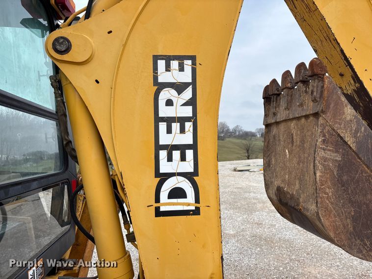 image for item ED2444 1999 John Deere 310E backhoe