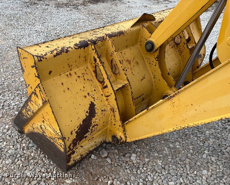 image for item ED2444 1999 John Deere 310E backhoe