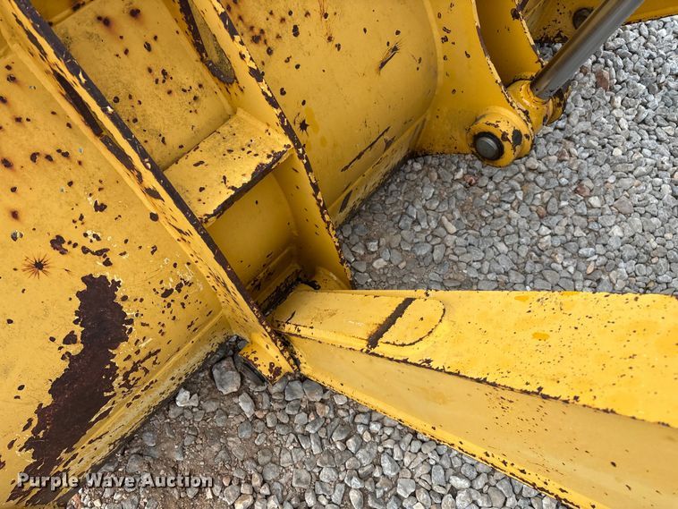 image for item ED2444 1999 John Deere 310E backhoe