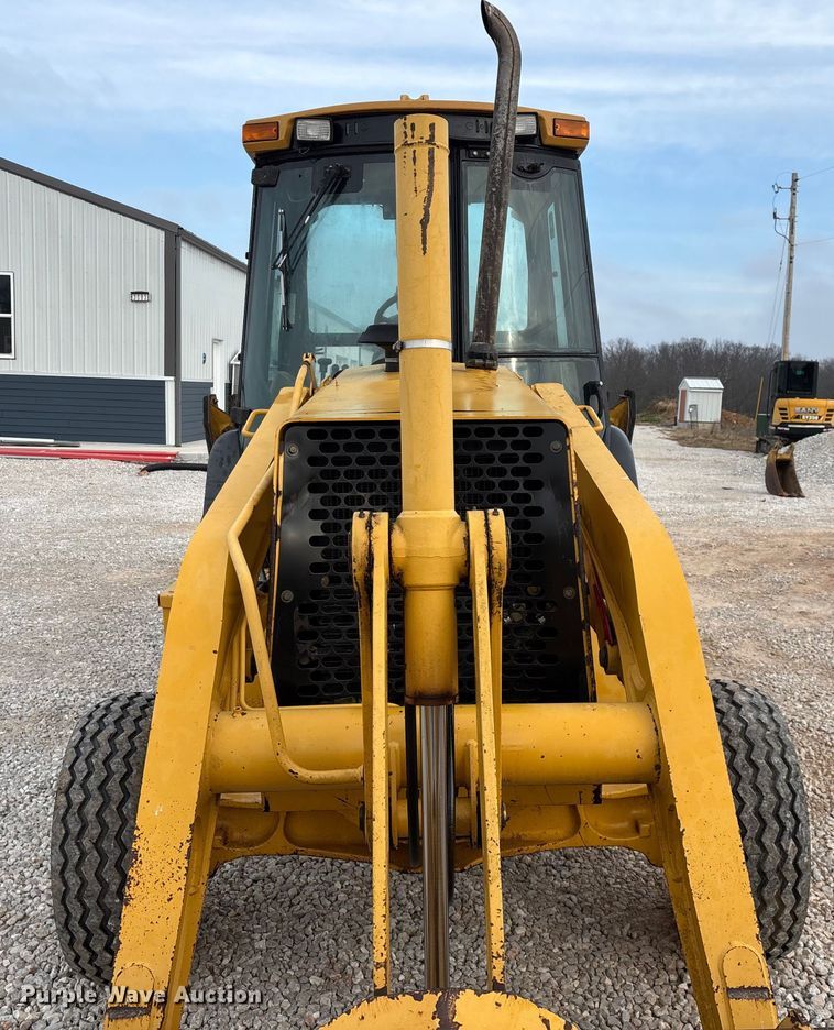 image for item ED2444 1999 John Deere 310E backhoe