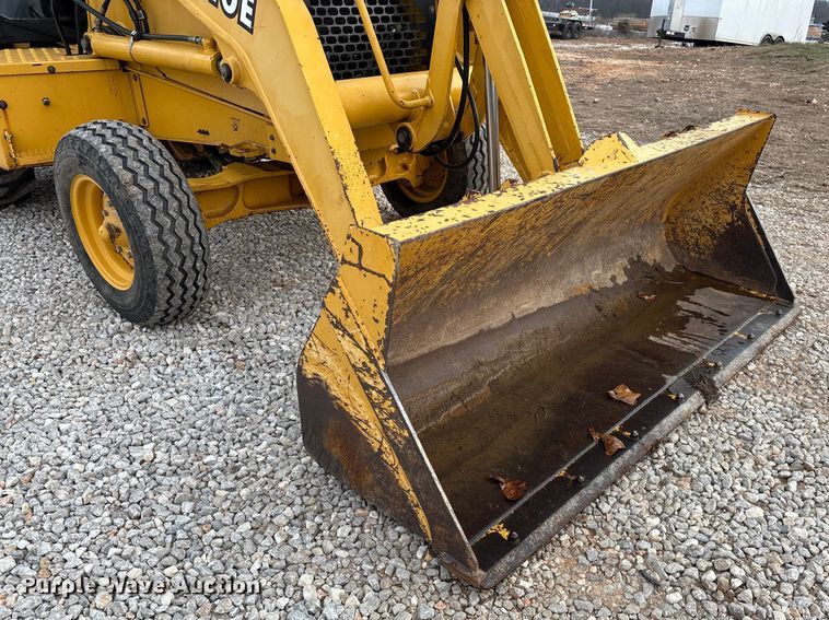 image for item ED2444 1999 John Deere 310E backhoe