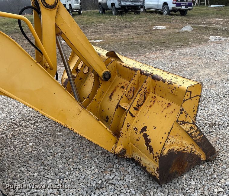 image for item ED2444 1999 John Deere 310E backhoe