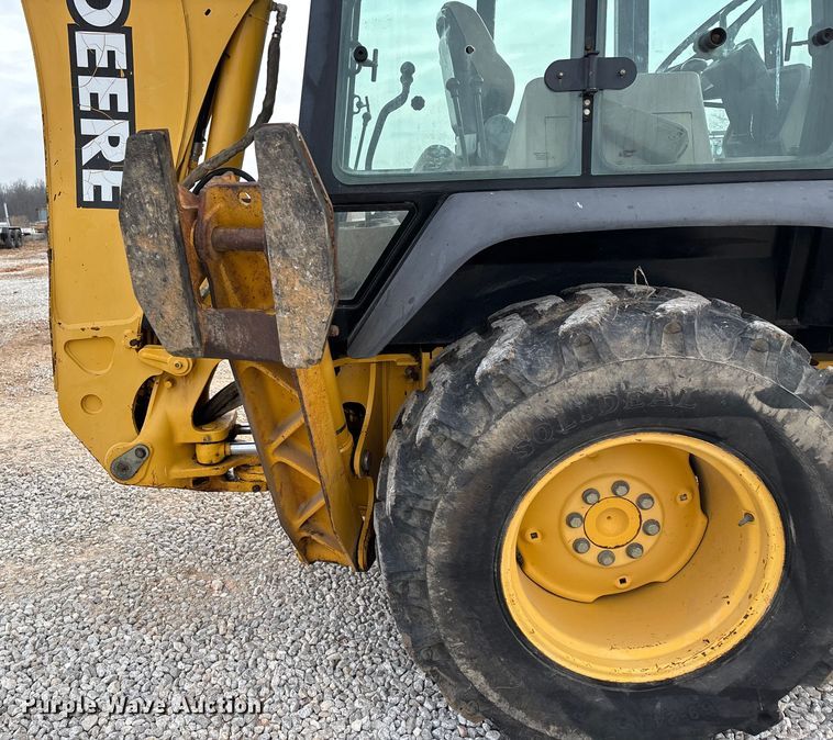 image for item ED2444 1999 John Deere 310E backhoe