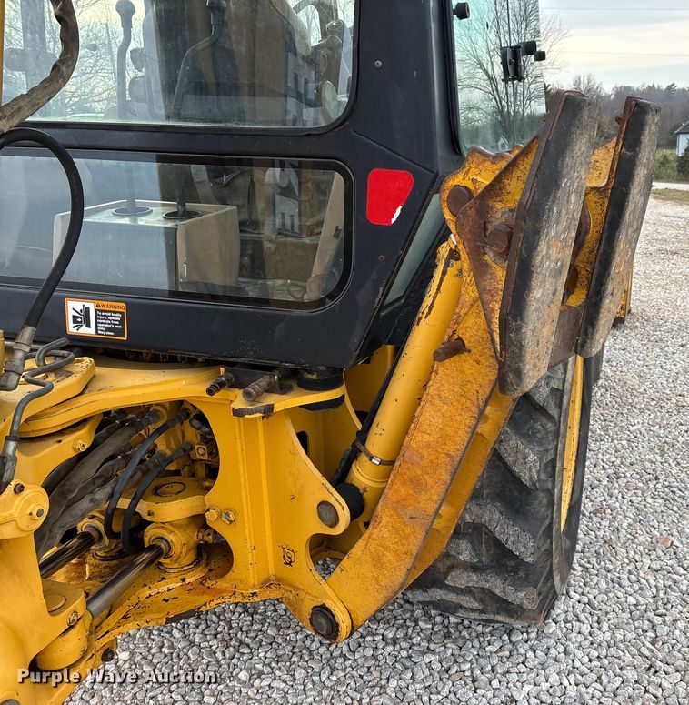 image for item ED2444 1999 John Deere 310E backhoe