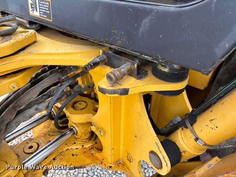 image for item ED2444 1999 John Deere 310E backhoe