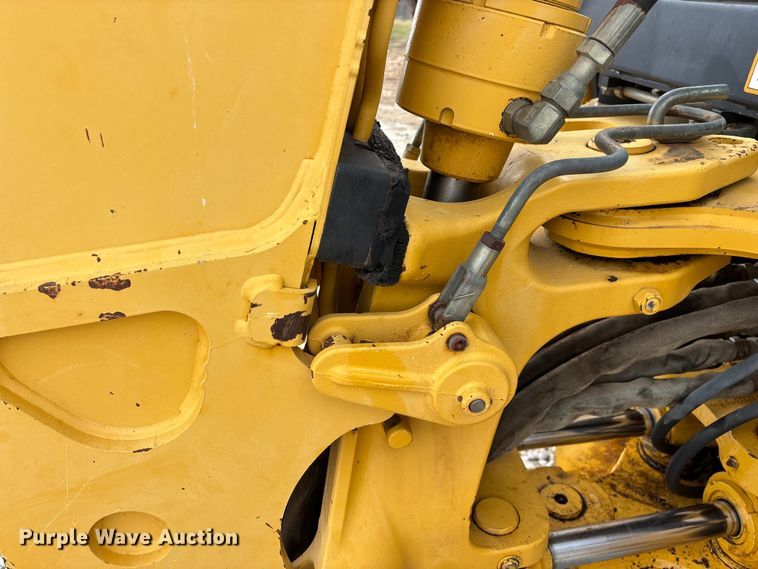 image for item ED2444 1999 John Deere 310E backhoe