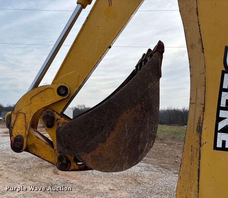 image for item ED2444 1999 John Deere 310E backhoe