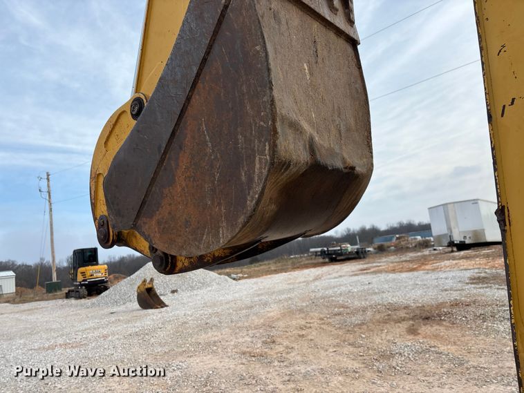 image for item ED2444 1999 John Deere 310E backhoe