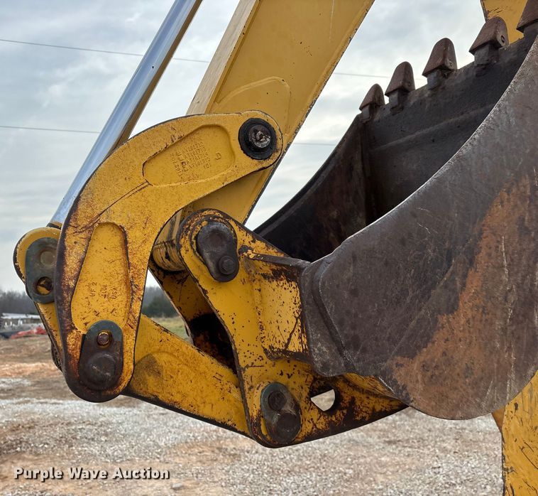 image for item ED2444 1999 John Deere 310E backhoe