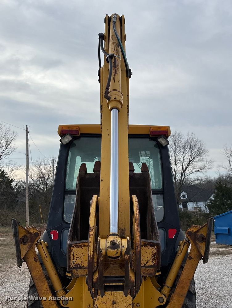 image for item ED2444 1999 John Deere 310E backhoe