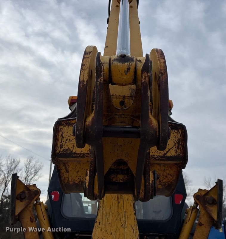 image for item ED2444 1999 John Deere 310E backhoe