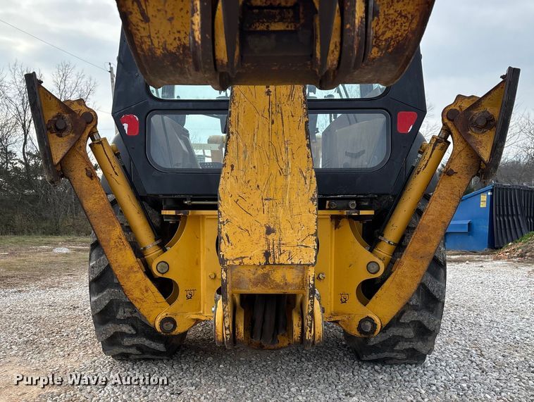 image for item ED2444 1999 John Deere 310E backhoe