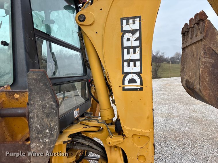 image for item ED2444 1999 John Deere 310E backhoe